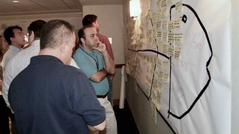 Brainstorming cost reductions at Detroit Diesel USA.