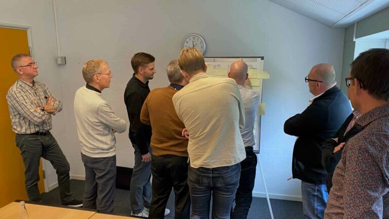 Lean workshop brainstorming session to identify weaknesses in existing customer-service process.